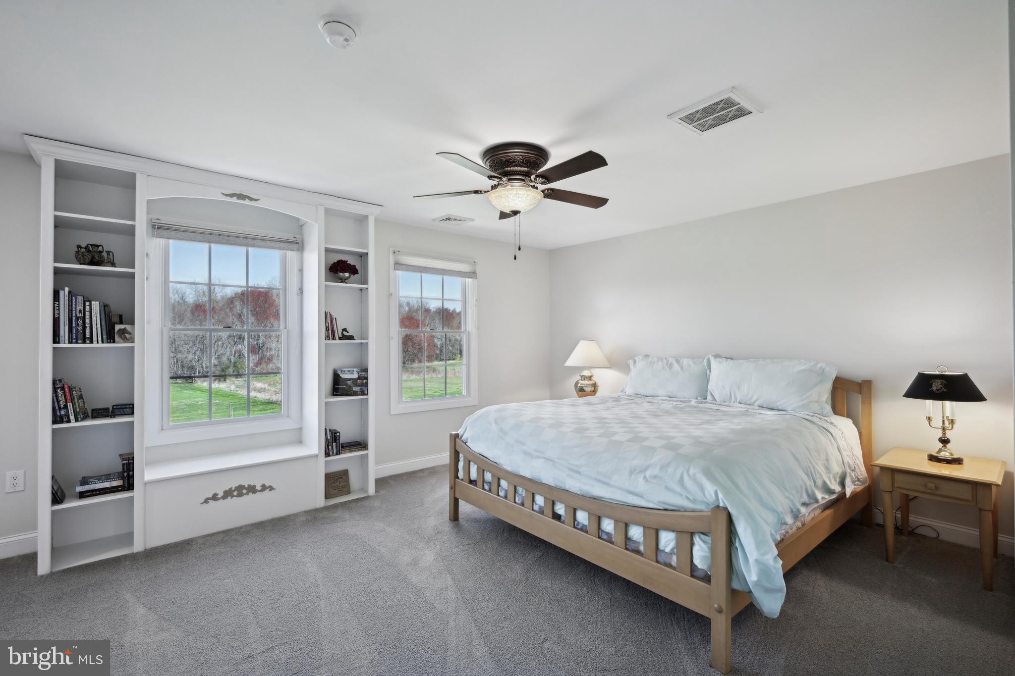 358 Eayrestown Road Southampton, NJ 08088 - Photo 28 of 54 a spacious bedroom with a bed and a ceiling fan