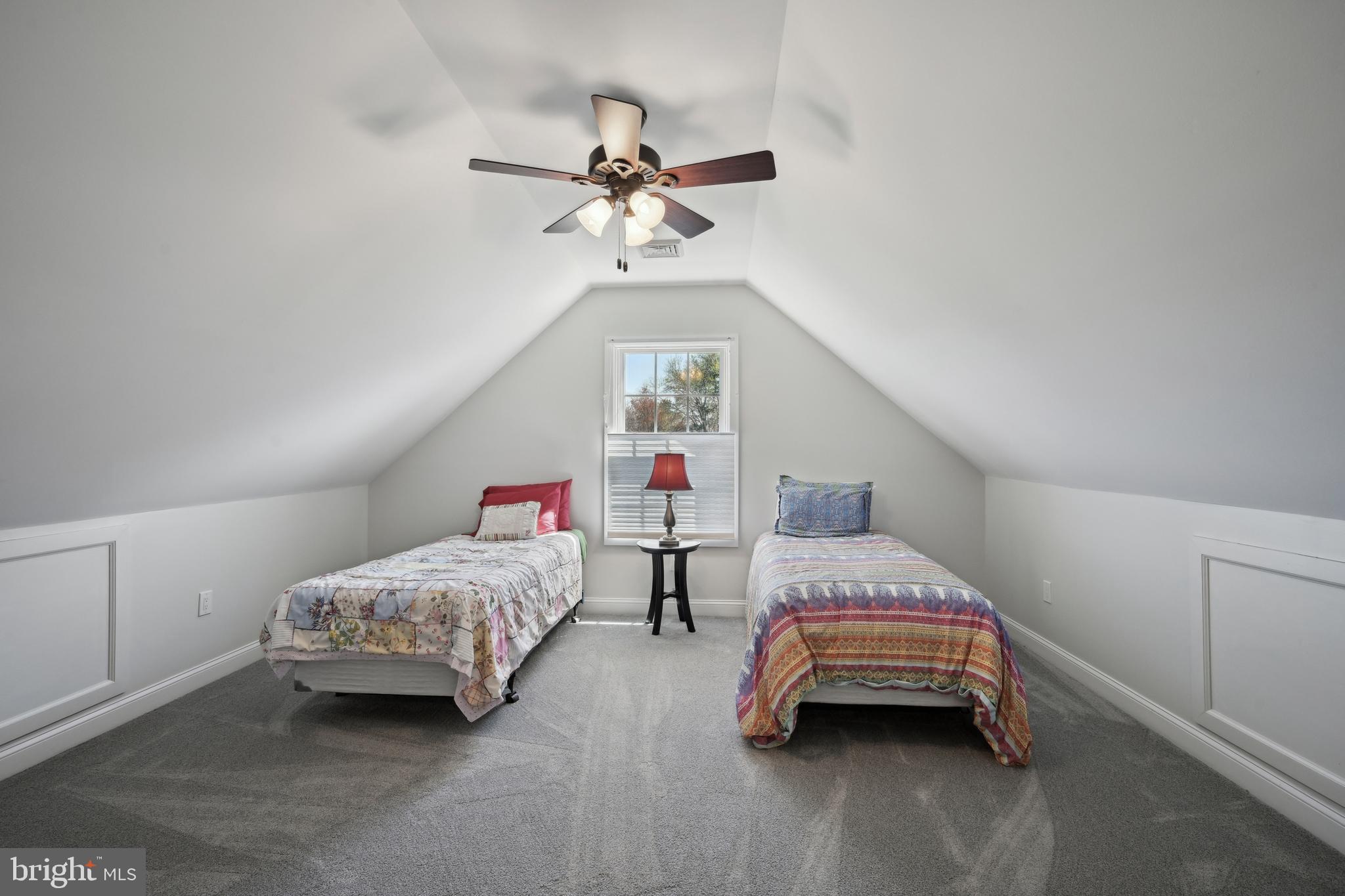 358 Eayrestown Road Southampton, NJ 08088 - Photo 29 of 54 a bedroom with a bed and a chandelier