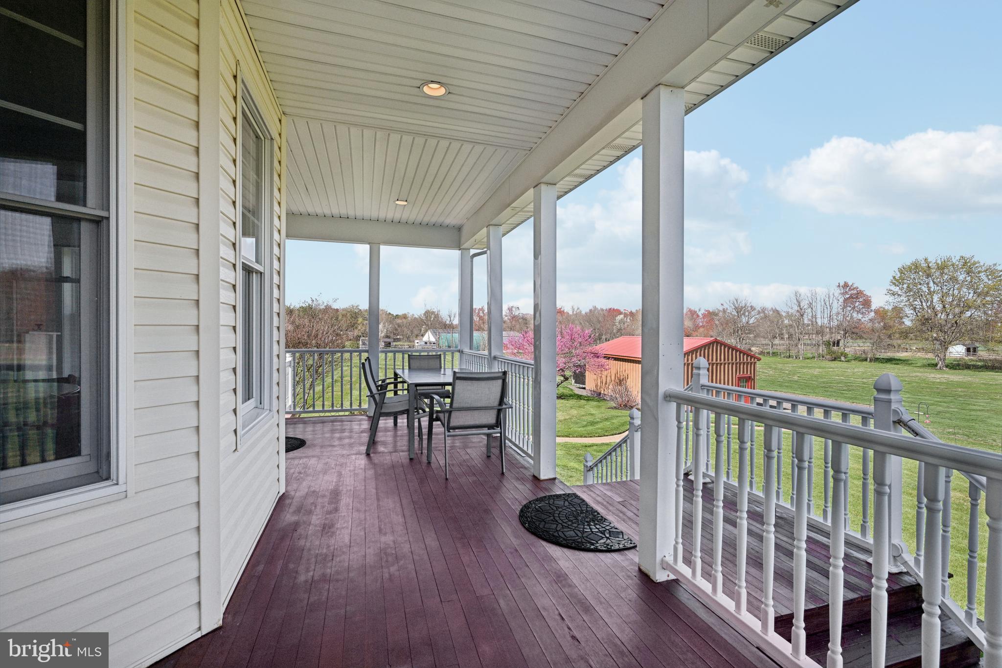 358 Eayrestown Road Southampton, NJ 08088 - Photo 31 of 54 a view of a porch with chairs and backyard