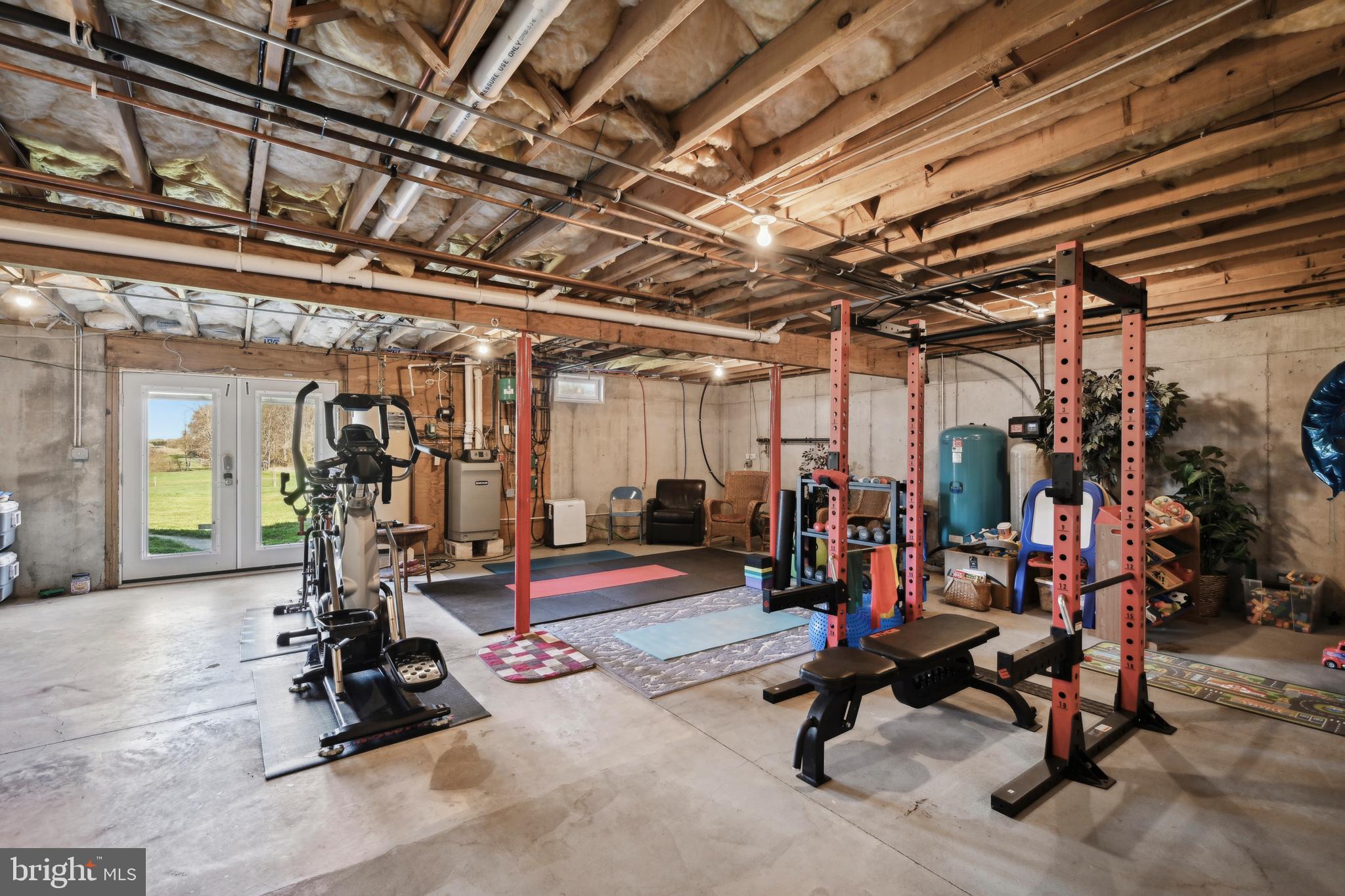 358 Eayrestown Road Southampton, NJ 08088 - Photo 32 of 54 a view of a room with gym equipment