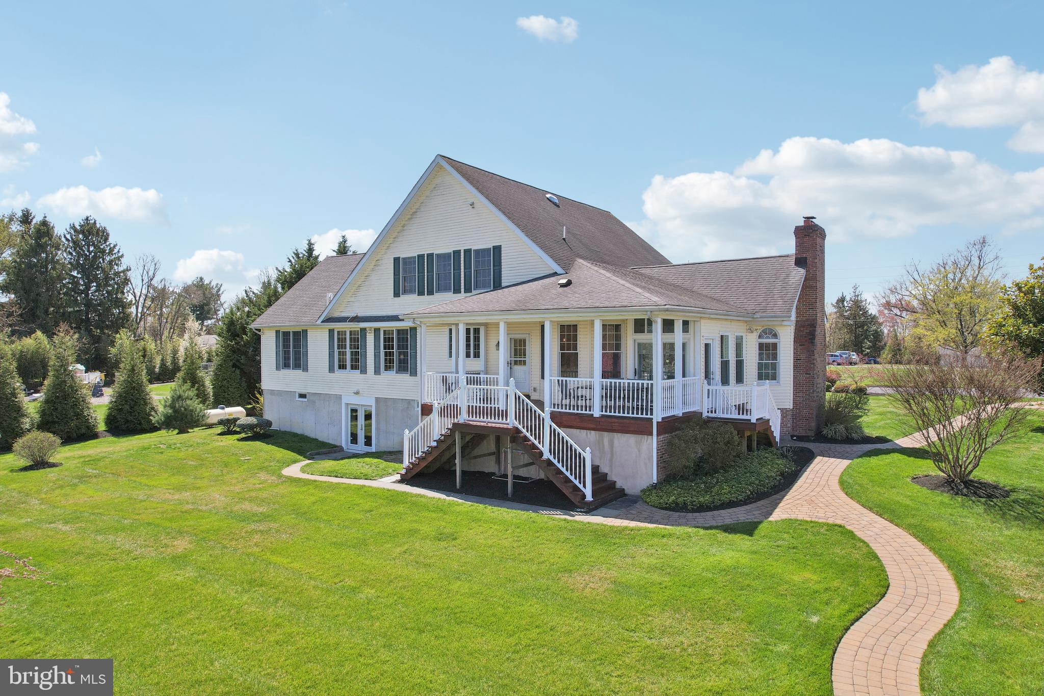 358 Eayrestown Road Southampton, NJ 08088 - Photo 45 of 54 a view of a house with a yard porch and sitting area