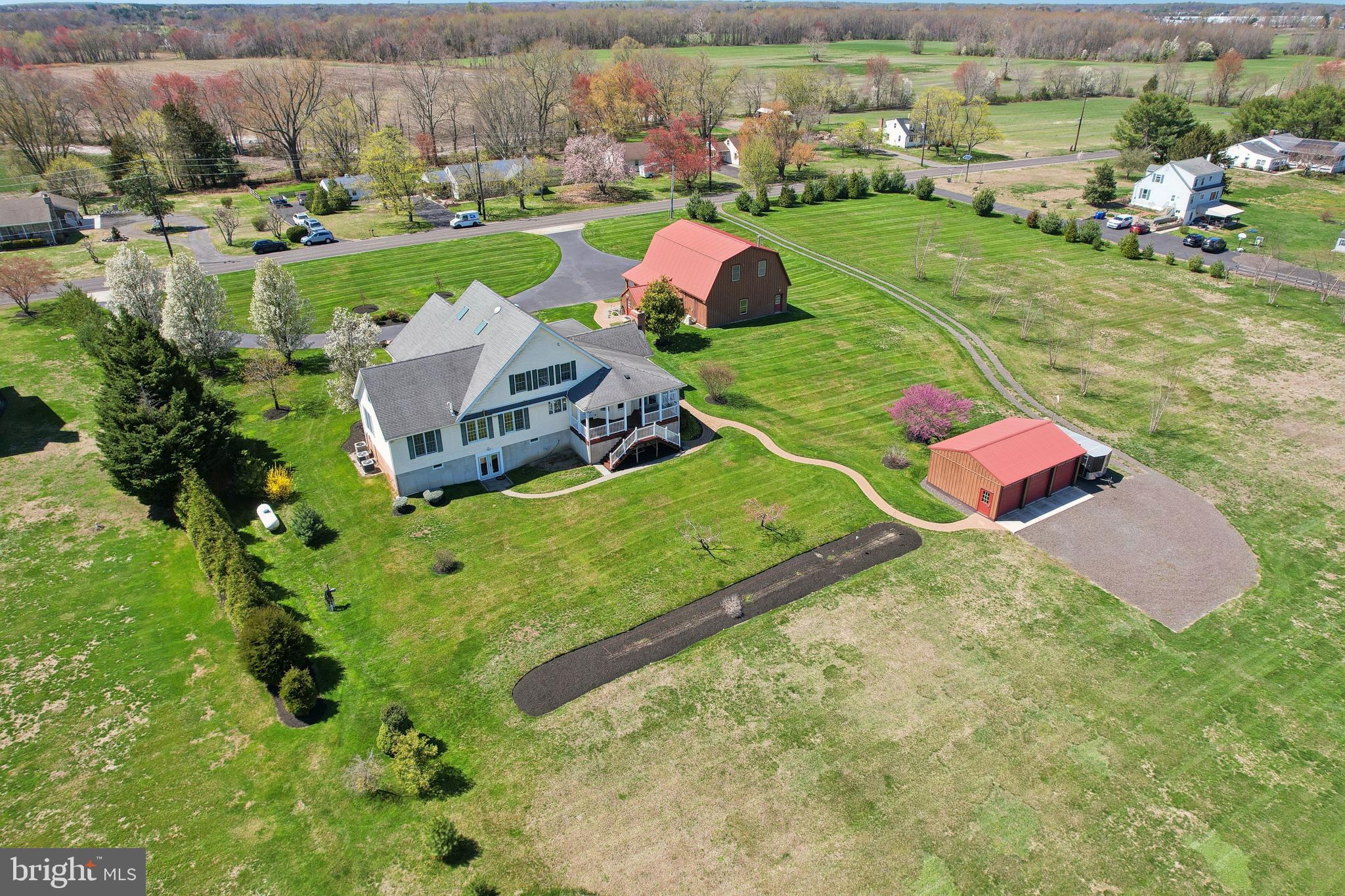 358 Eayrestown Road Southampton, NJ 08088 - Photo 49 of 54 an aerial view of a house with yard and lake view