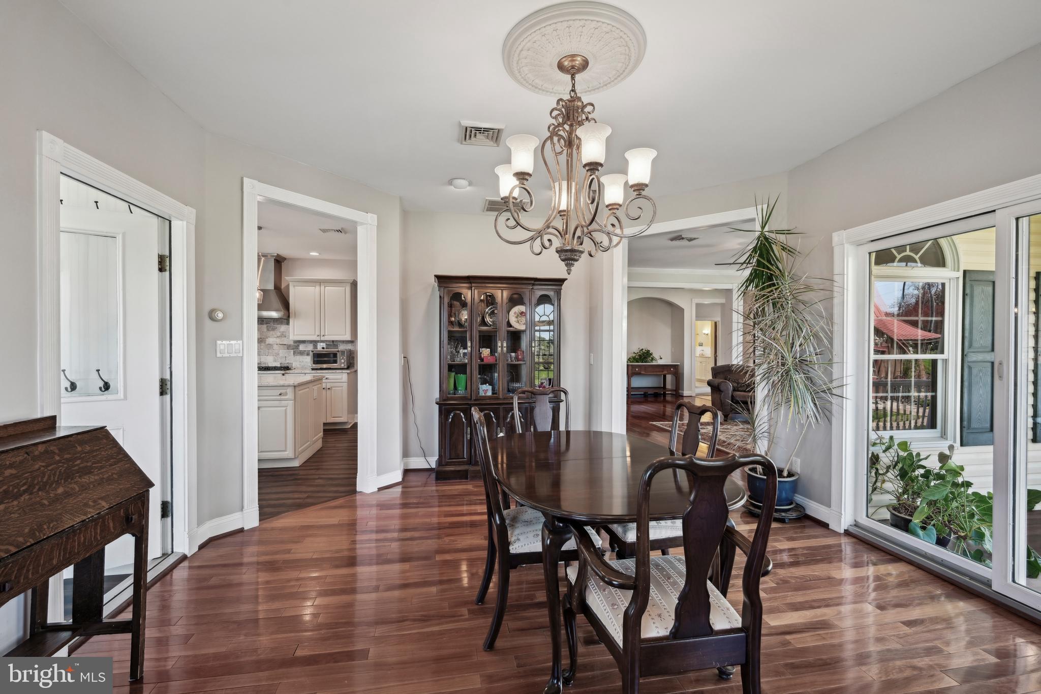 358 Eayrestown Road Southampton, NJ 08088 - Photo 8 of 54 a view of a dining room with furniture window and wooden floor