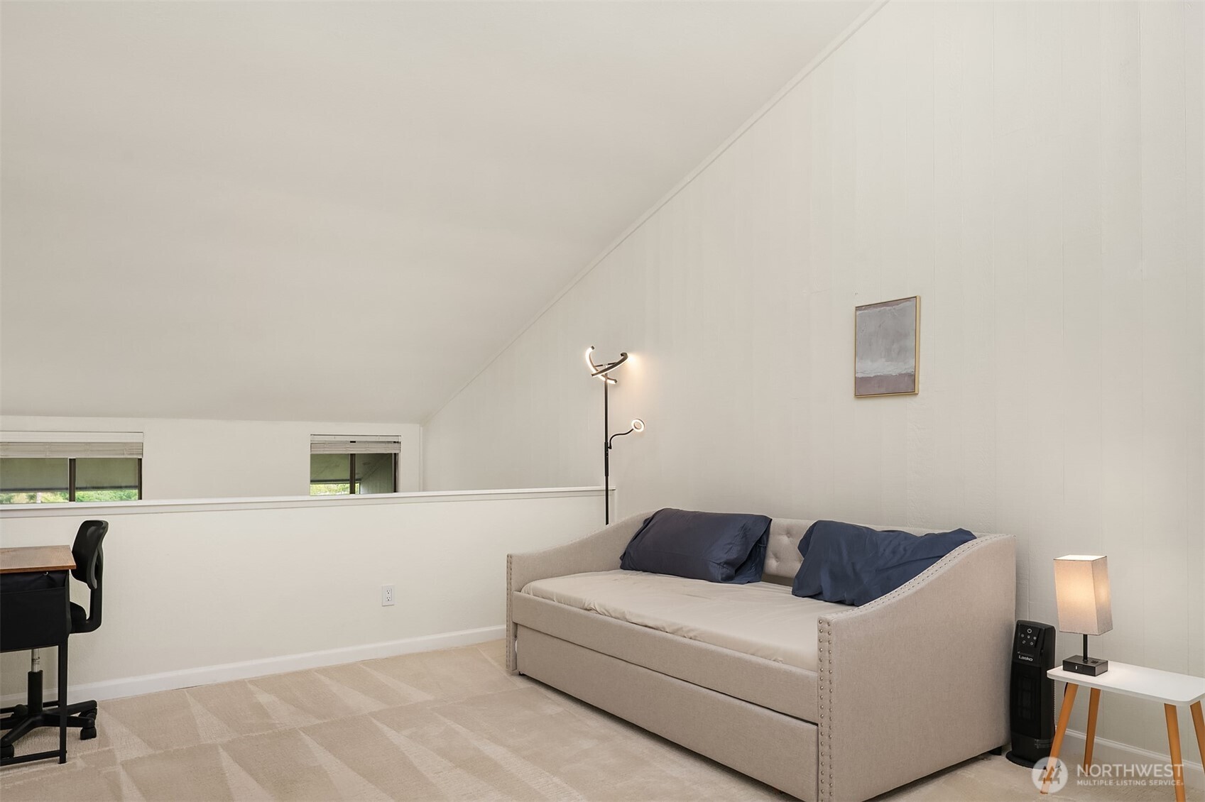 6582 137th Avenue Northeast, Unit 414 Redmond, WA 98052 - Photo 17 of 28 a living room with furniture and a window