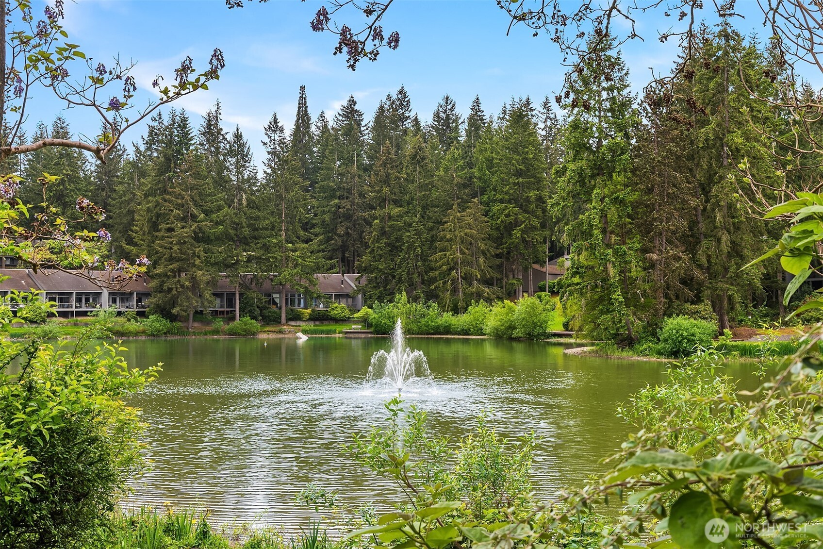 6582 137th Avenue Northeast, Unit 414 Redmond, WA 98052 - Photo 27 of 28 a view of a lake view with a garden