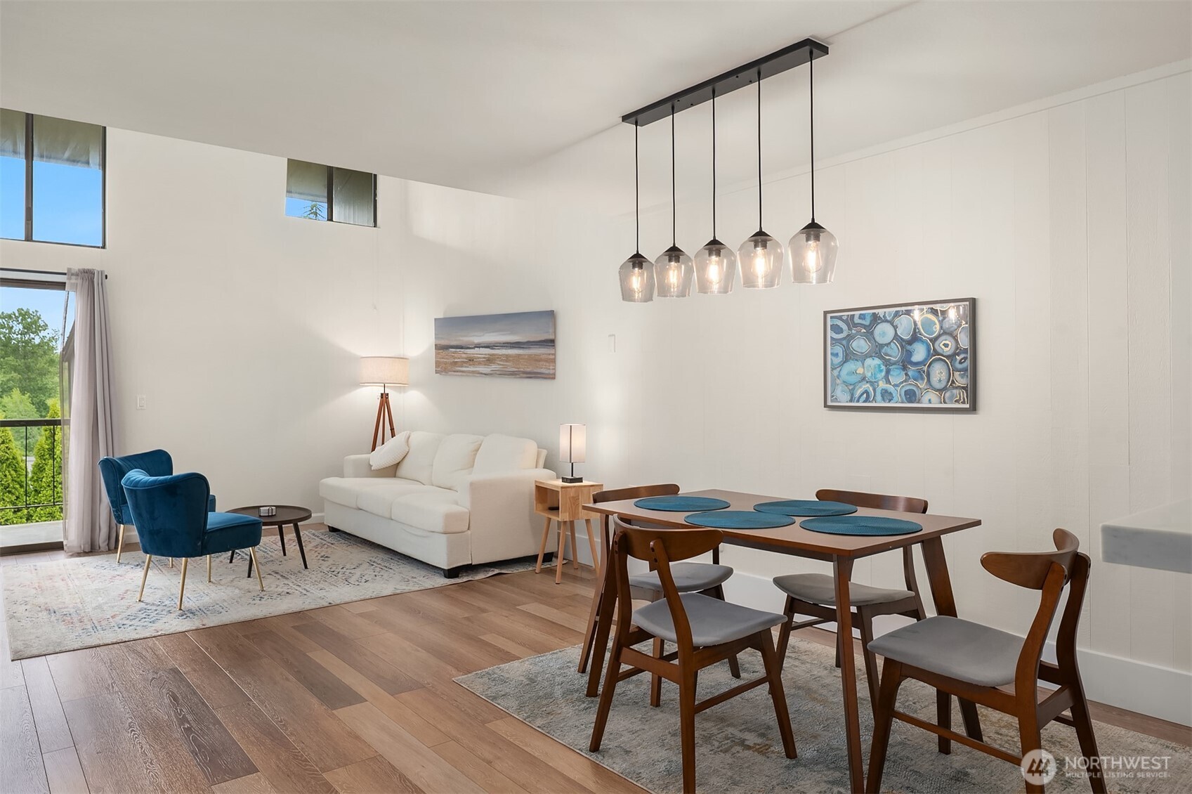 6582 137th Avenue Northeast, Unit 414 Redmond, WA 98052 - Photo 5 of 28 a living room with furniture and wooden floor