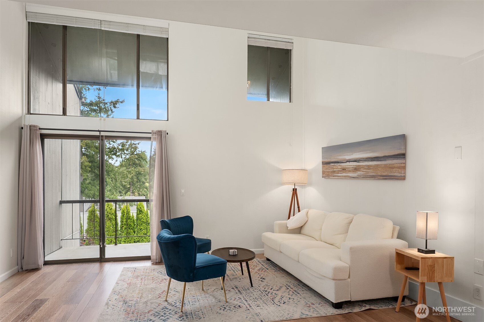 6582 137th Avenue Northeast, Unit 414 Redmond, WA 98052 - Photo 6 of 28 a living room with furniture and a window