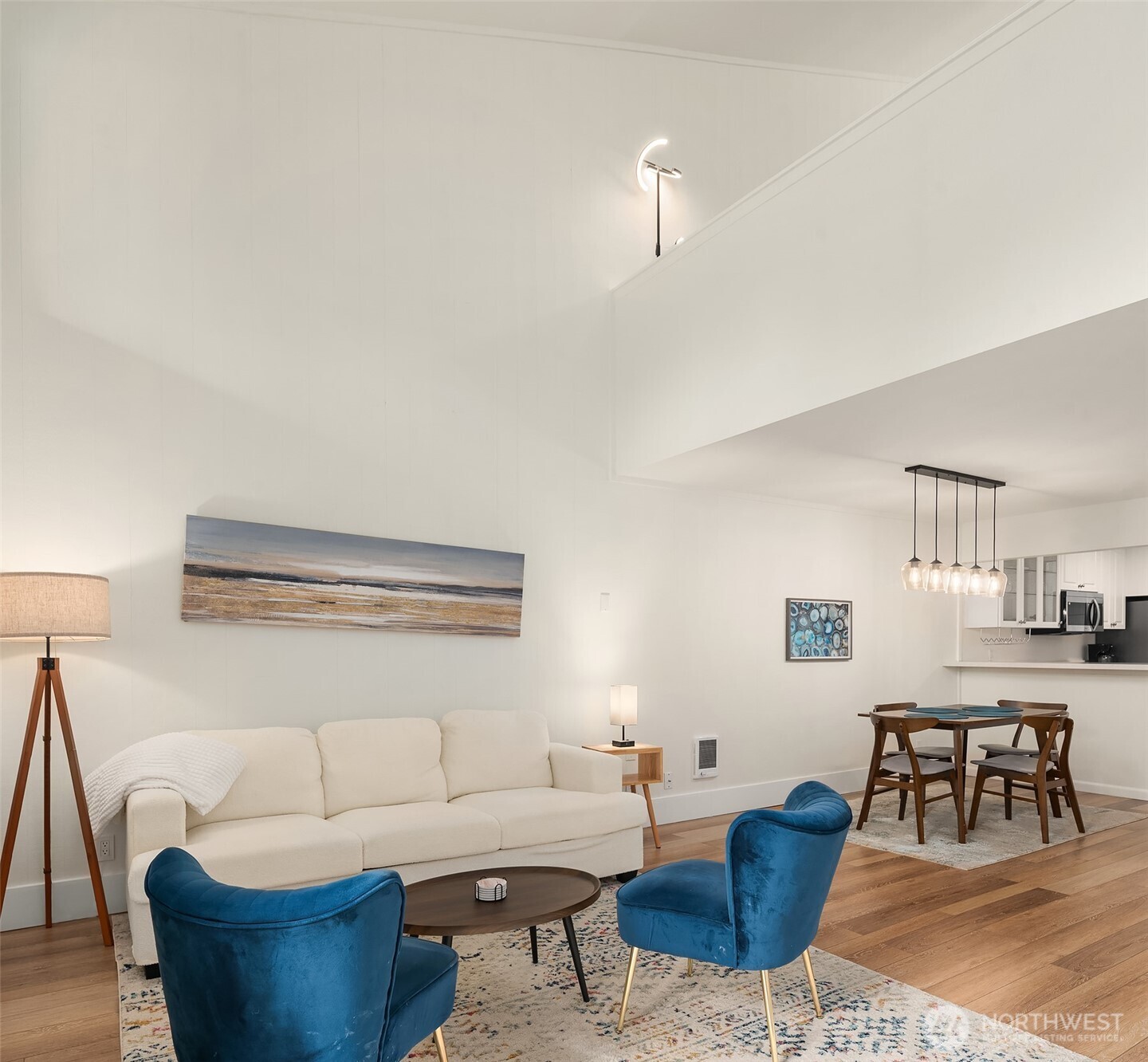 6582 137th Avenue Northeast, Unit 414 Redmond, WA 98052 - Photo 7 of 28 a living room with furniture and wooden floor