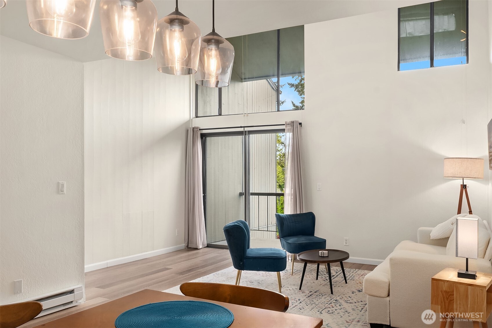 6582 137th Avenue Northeast, Unit 414 Redmond, WA 98052 - Photo 10 of 28 a view of a livingroom with furniture and window