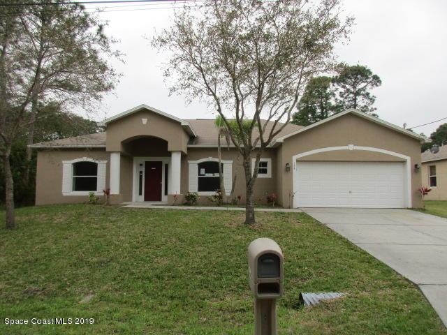124 Haines Road Southwest Palm Bay, FL 32908 - Photo 1 of 14 Front