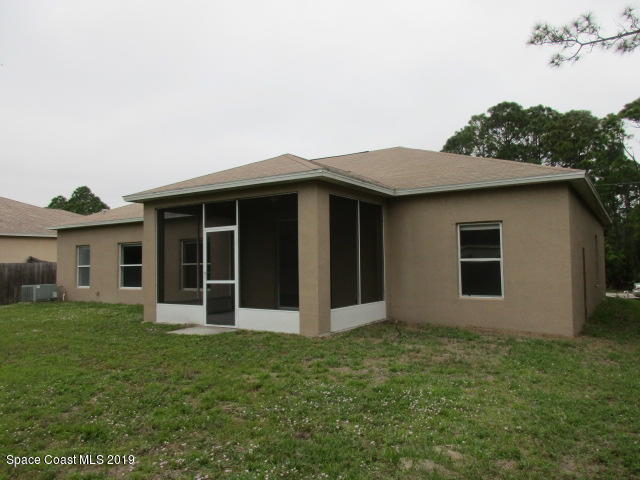124 Haines Road Southwest Palm Bay, FL 32908 - Photo 2 of 14 Rear