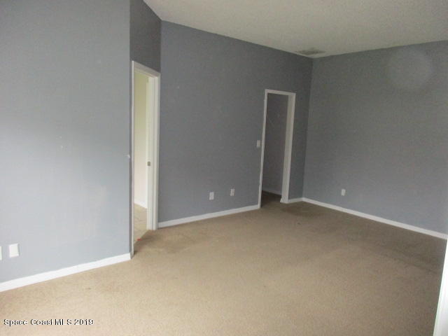 124 Haines Road Southwest Palm Bay, FL 32908 - Photo 11 of 14 Master Bedroom