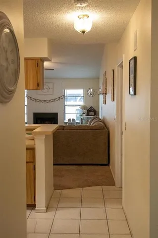 a bedroom with a bed and a mirror