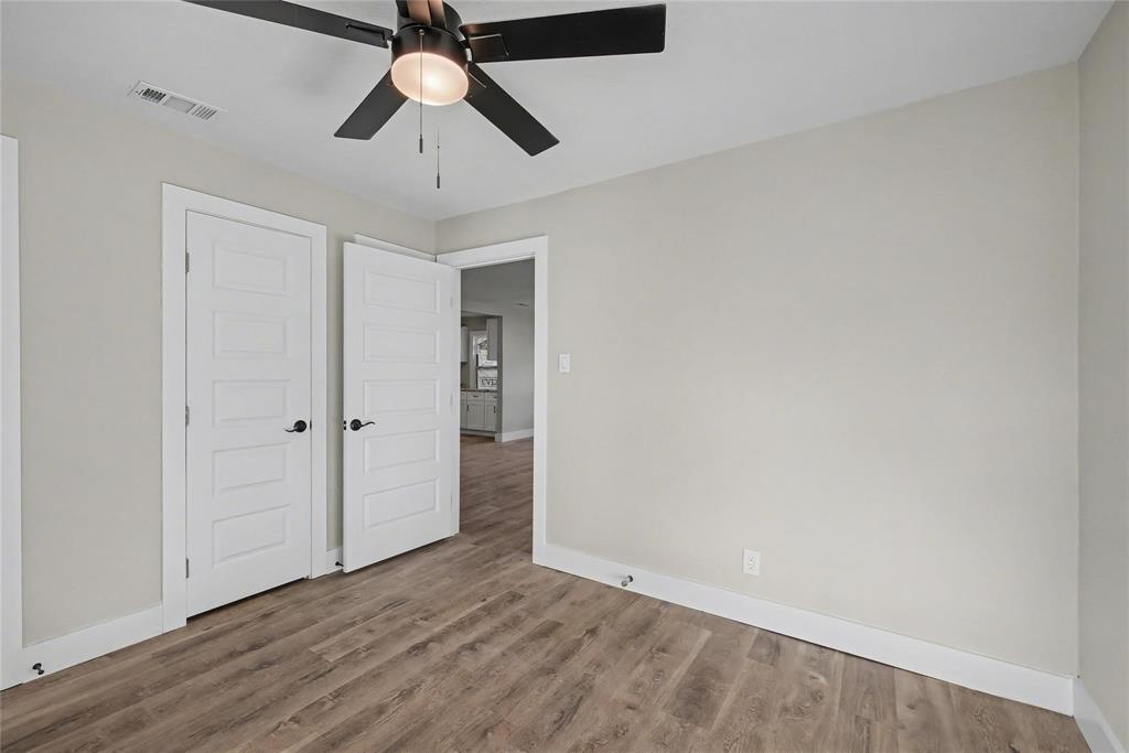 4220 Ramey Avenue Fort Worth, TX 76105 - Photo 13 of 24 a view of empty room with wooden floor