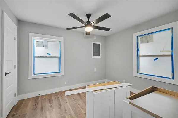 a view of an empty room with a window