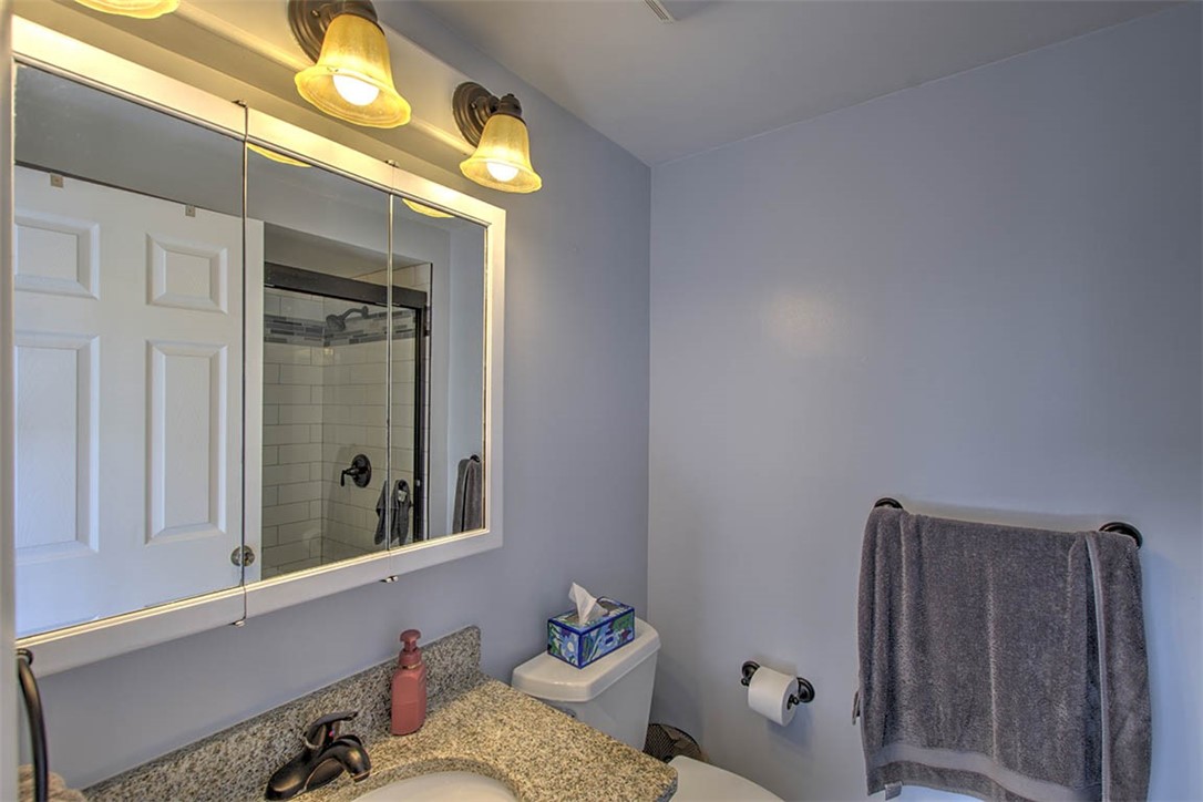120 Point Bluff Drive Decatur, IL 62521 - Photo 18 of 34 a bathroom with a sink mirror and vanity
