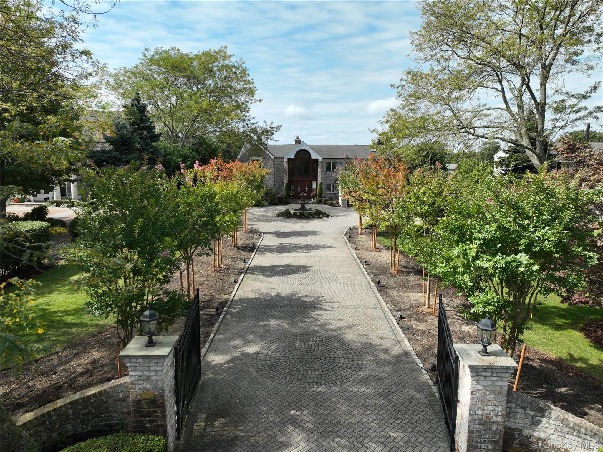 10 Beech Road Islip, NY 11751 - Photo 3 of 49 Magnificent tree lined driveway leading to this waterfront beauty.