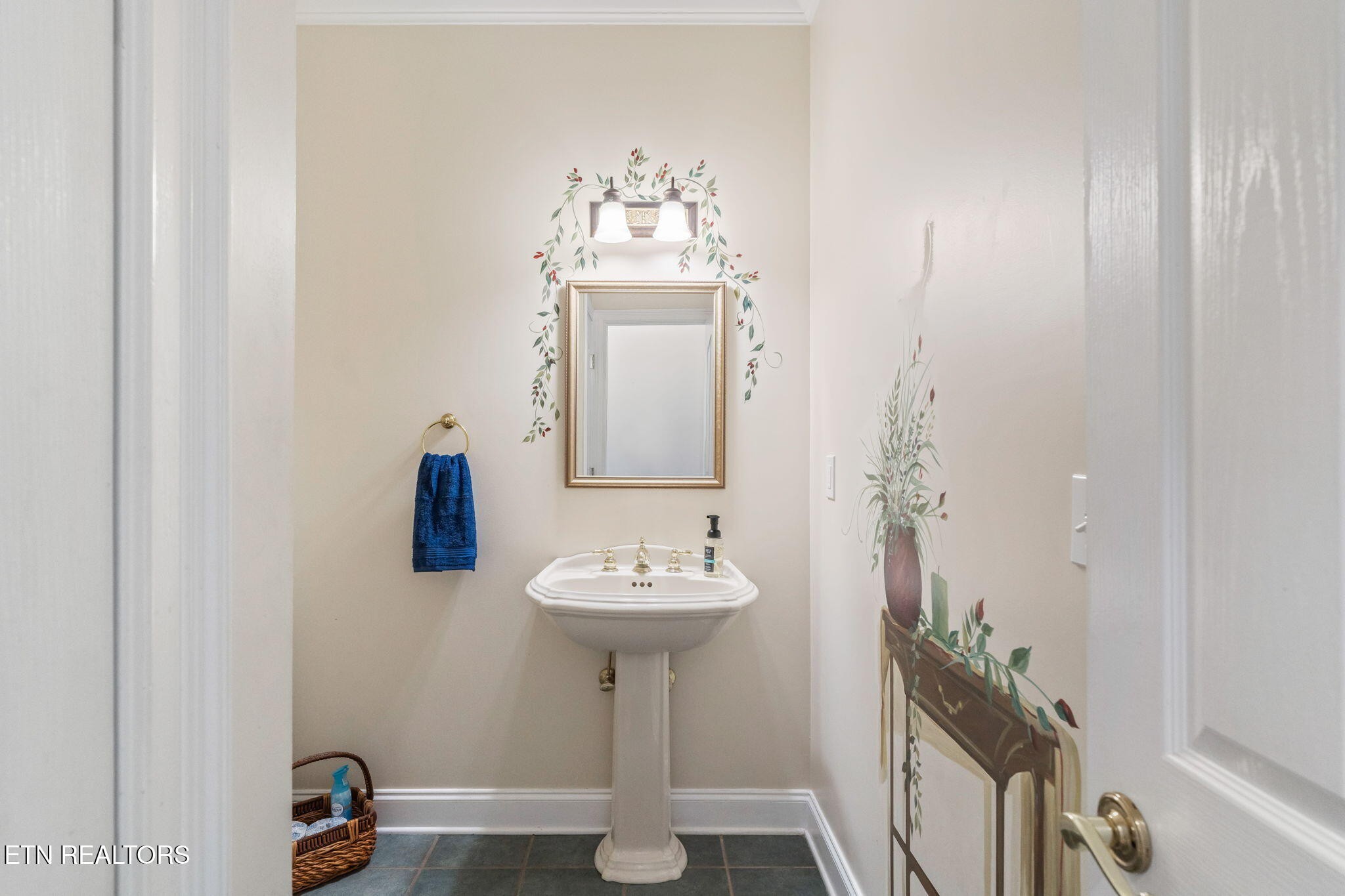 2572 Little Valley Road Loudon, TN 37774 - Photo 32 of 57 a bathroom with a sink and a mirror