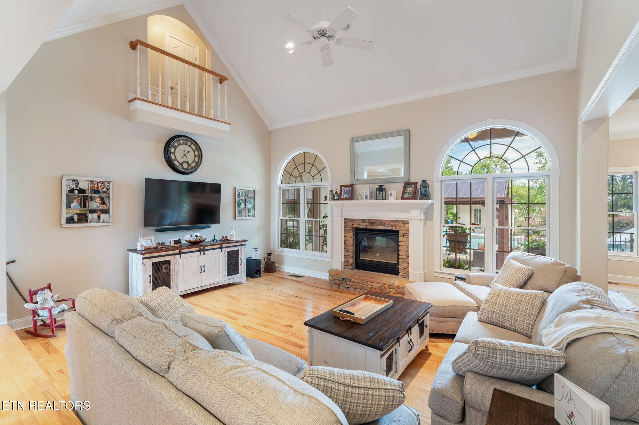 2572 Little Valley Road Loudon, TN 37774 - Photo 7 of 57 a living room with furniture a fireplace and a flat screen tv