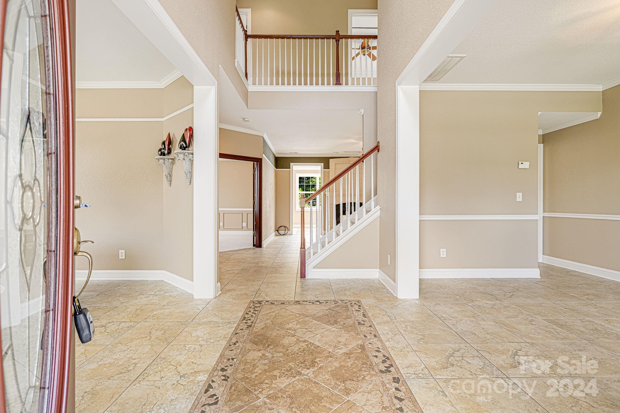 385 Wildbriar Road Fletcher, NC 28732 - Photo 4 of 42 an entryway with a rug
