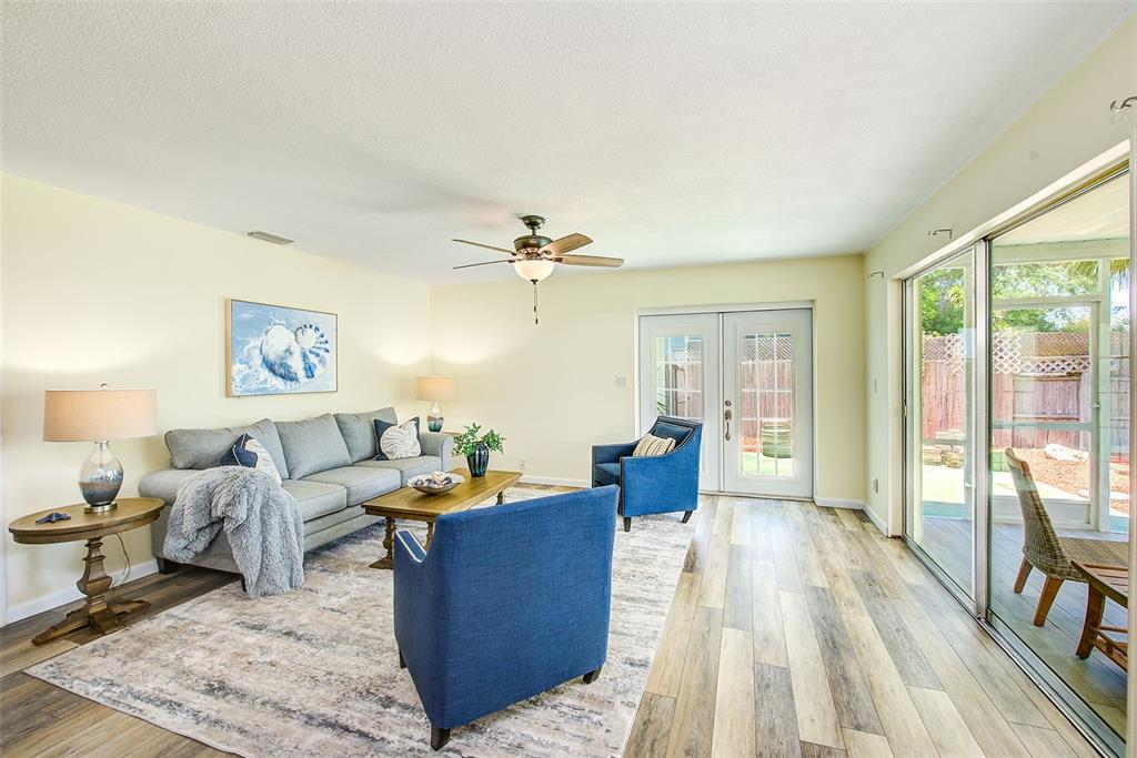 14079 Victoria Road Largo, FL 33774 - Photo 16 of 46 a living room with furniture and a large window