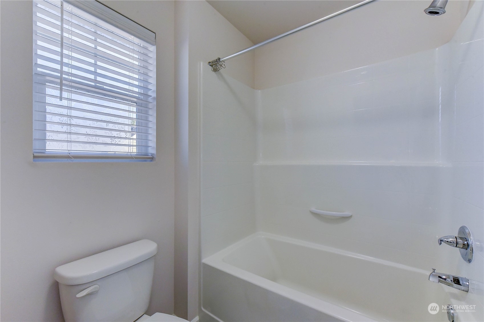 4501 30th Drive Southeast Everett, WA 98203 - Photo 13 of 29 a white bath tub sitting next to a toilet