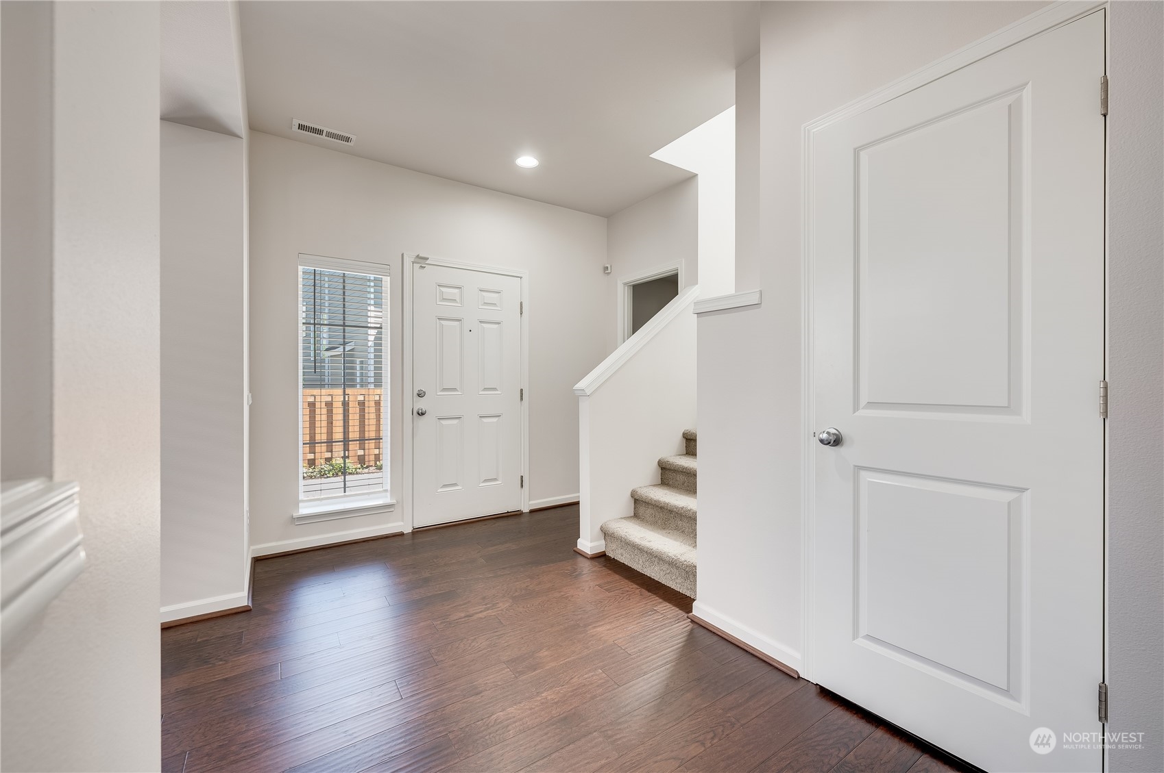 4501 30th Drive Southeast Everett, WA 98203 - Photo 19 of 29 an empty room with wooden floor and windows
