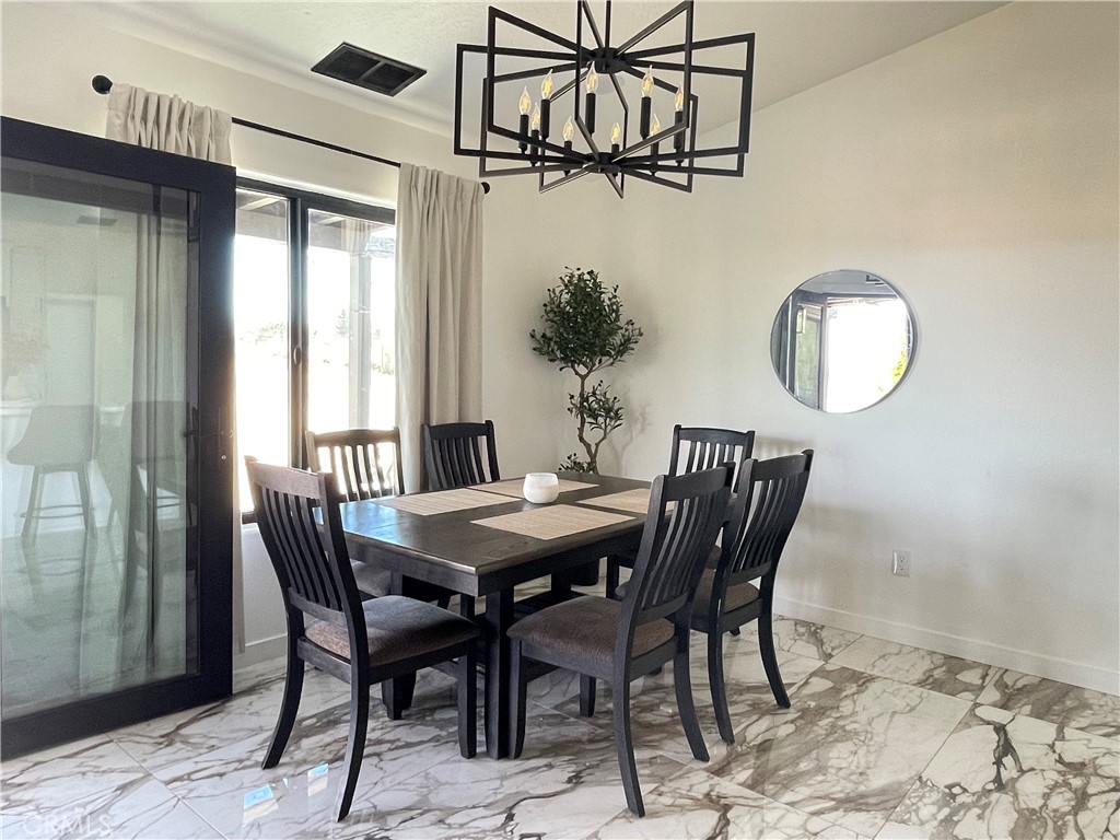 11375 4th Hesperia, CA 92345 - Photo 11 of 37 a dining room with furniture and window