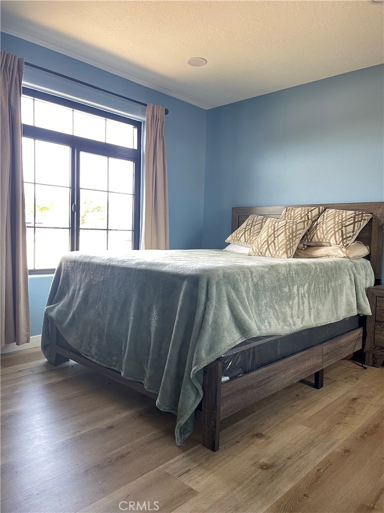 11375 4th Hesperia, CA 92345 - Photo 23 of 37 a bedroom with a bed and window