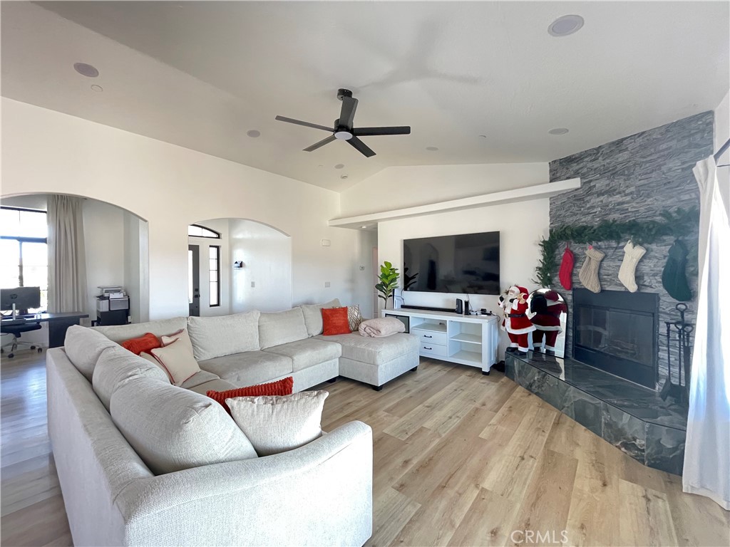 11375 4th Hesperia, CA 92345 - Photo 9 of 37 a living room with furniture and a flat screen tv