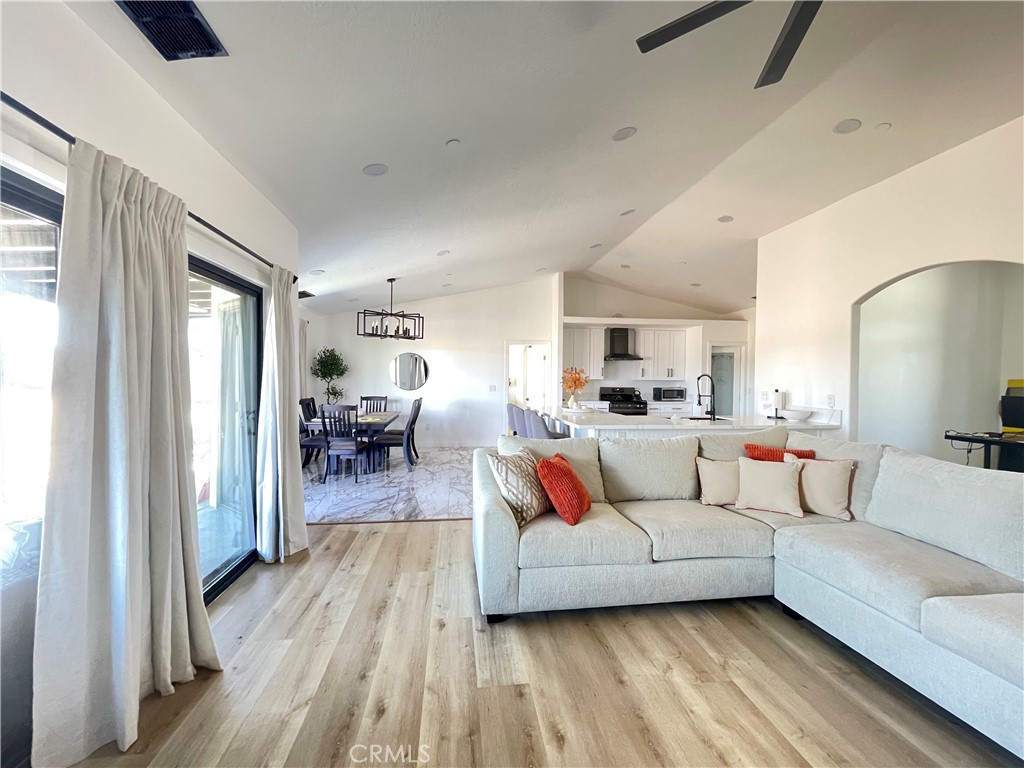 11375 4th Hesperia, CA 92345 - Photo 10 of 37 a living room with furniture and a wooden floor