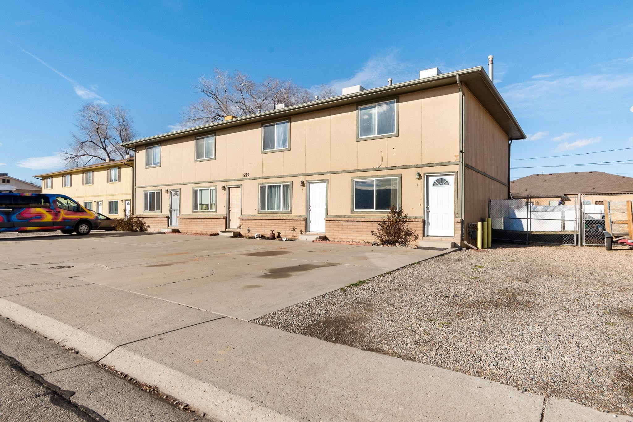 559 West Pabor Way, Unit 4 Fruita, CO 81521 - Photo 16 of 16 a view of a car park in front of a building