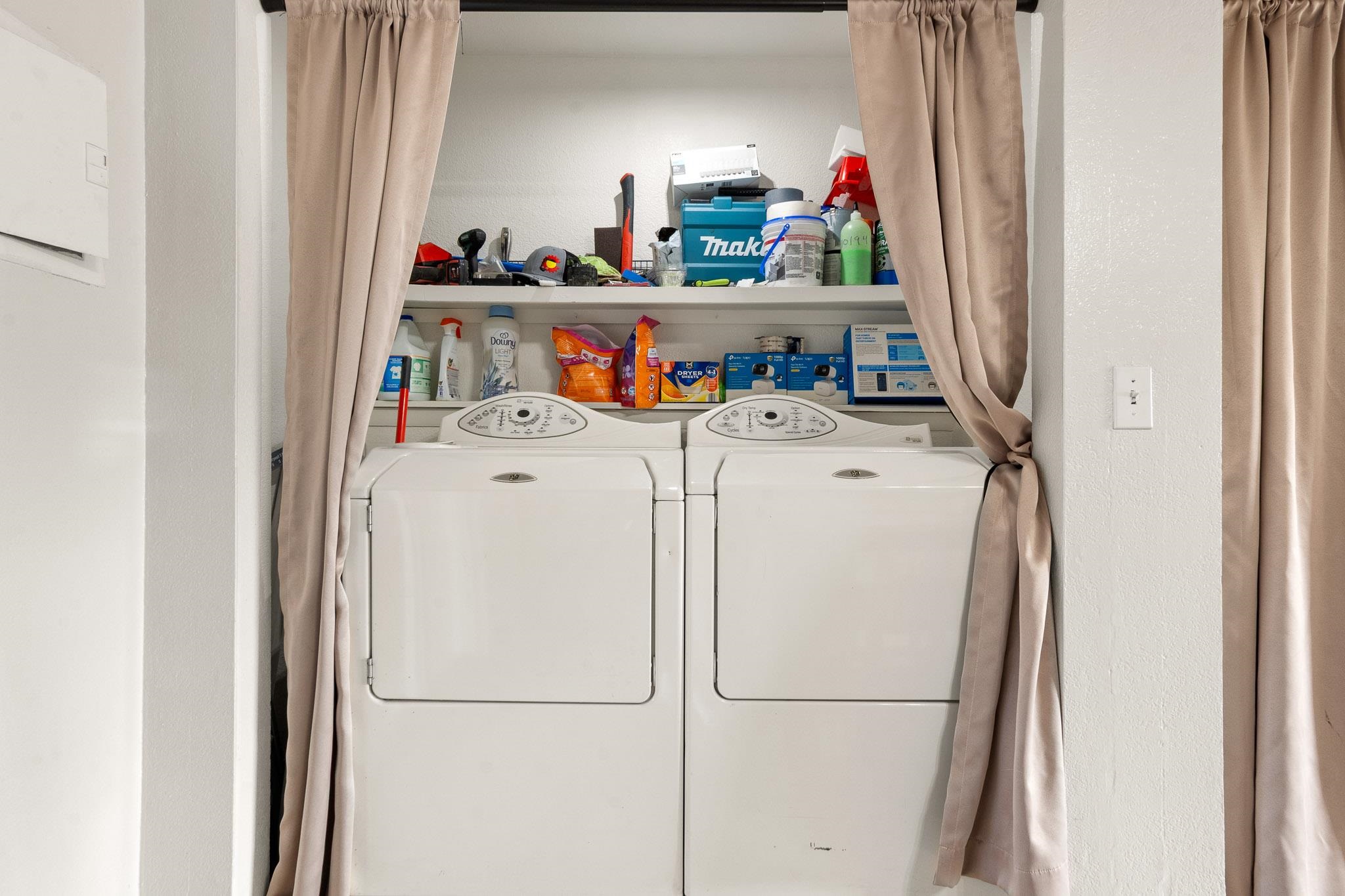 559 West Pabor Way, Unit 4 Fruita, CO 81521 - Photo 8 of 16 a utility room with dryer and washer