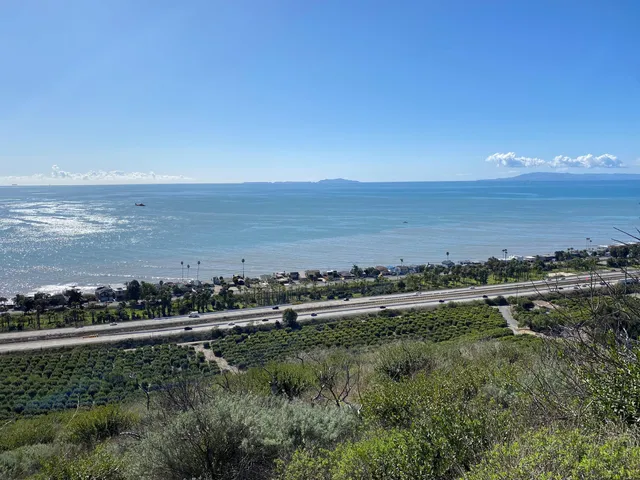 a view of an ocean and mountain view