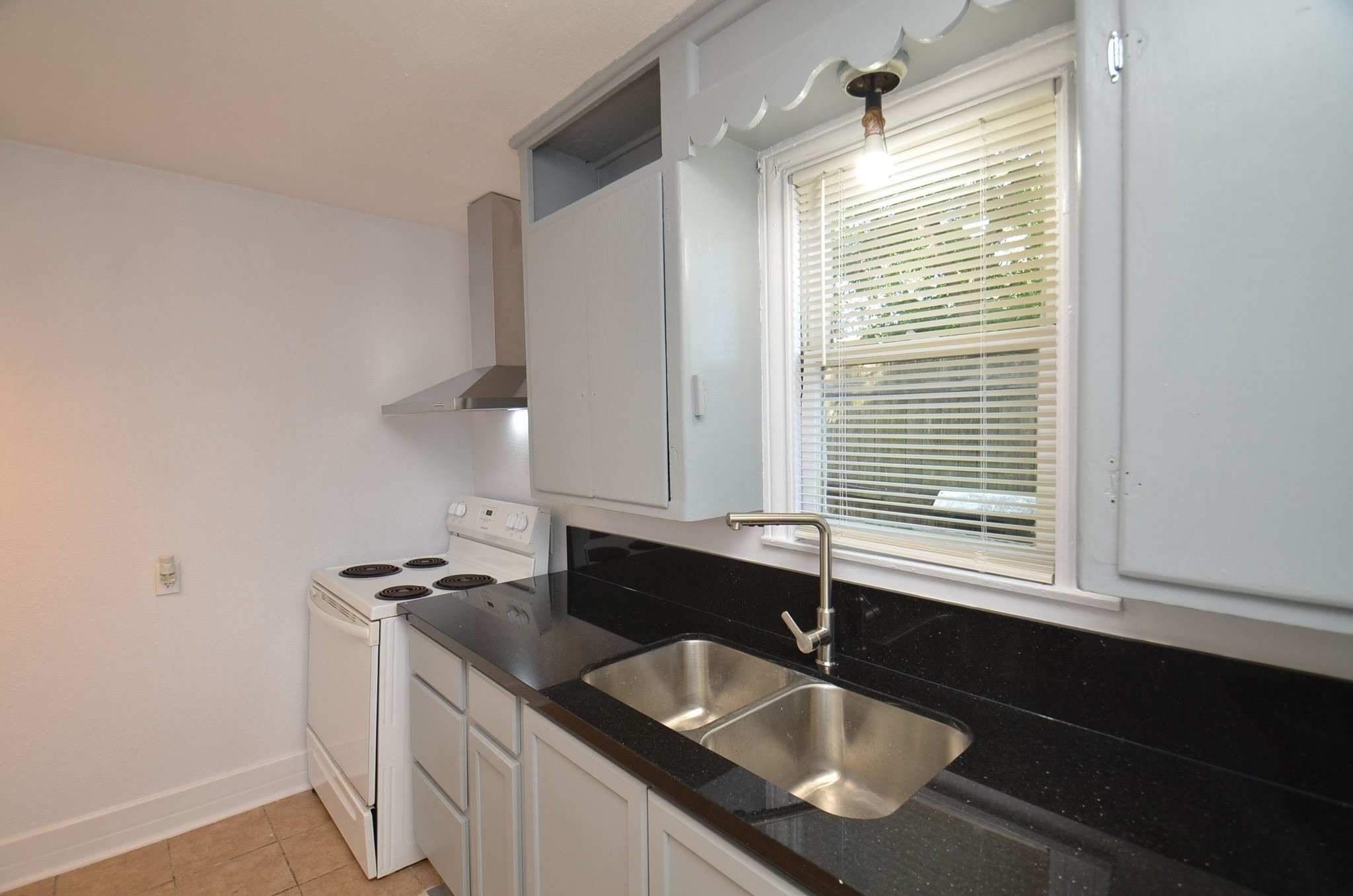 1600 5th Street Rosenberg, TX 77471 - Photo 11 of 24 Spacious kitchen with plenty of prep and workspace.