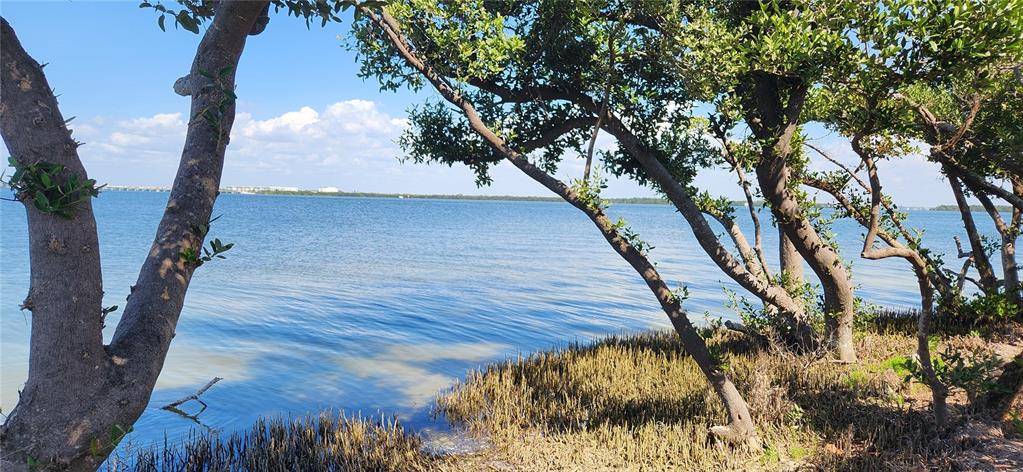 28th Street Holmes Beach, FL 34217 - Photo 3 of 7 a view of an outdoor space and a yard
