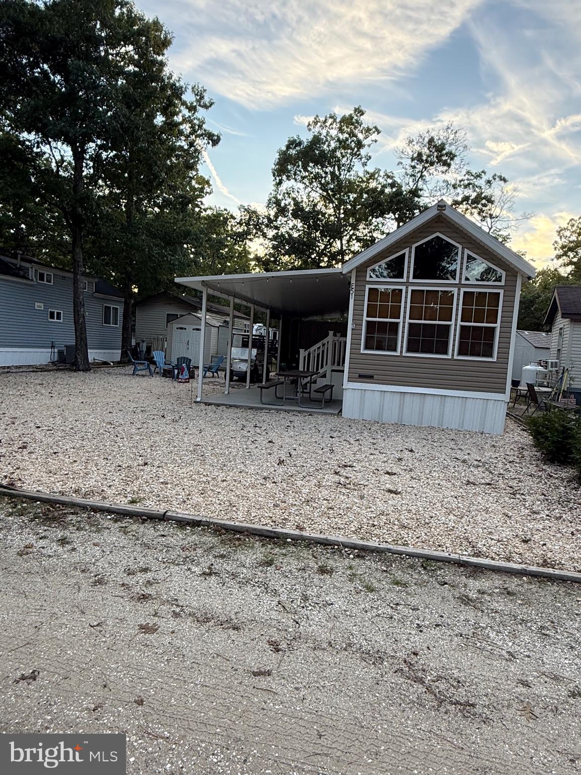 515 Corsons Tavern Road, Unit E51 Ocean View, NJ 08230 - Photo 12 of 12 a front view of a house with garden