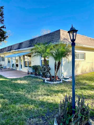 a view of a porch with a yard