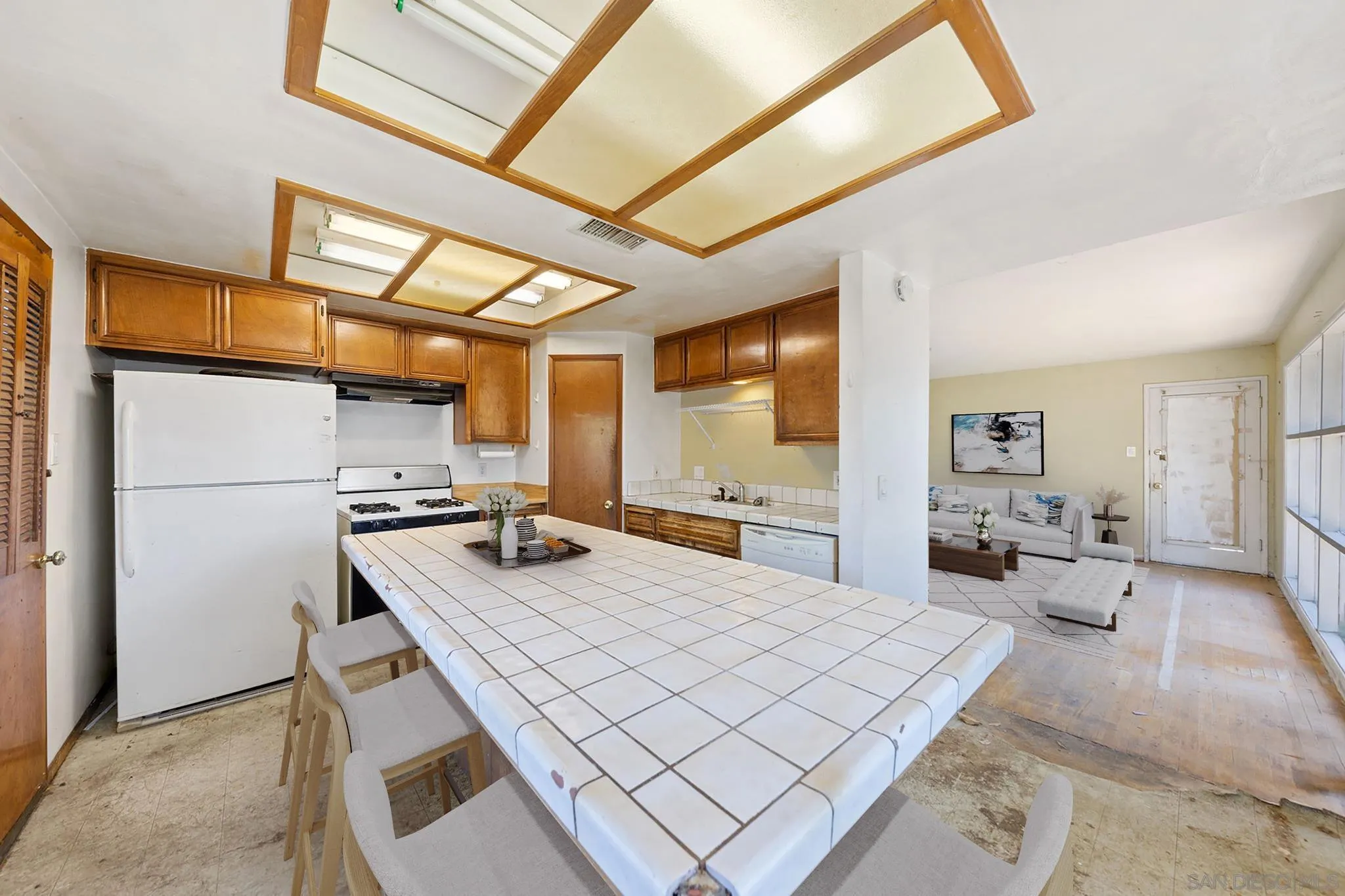 4690 Jarvis Street Riverside, CA 92506 - Photo 7 of 16 a bedroom with a bed and a table
