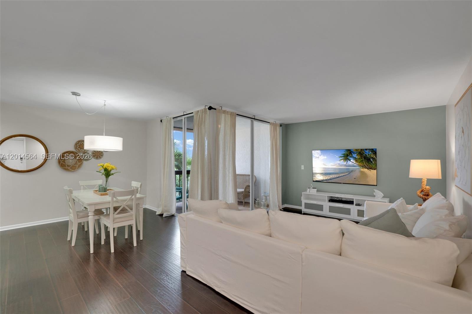 500 Egret Circle, Unit 8403 Delray Beach, FL 33444 - Photo 12 of 32 a living room with furniture and wooden floor