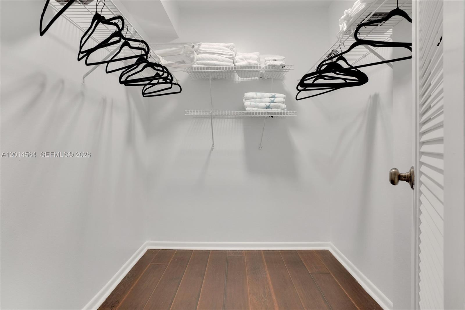 500 Egret Circle, Unit 8403 Delray Beach, FL 33444 - Photo 17 of 32 a view of a room with rack on the wall