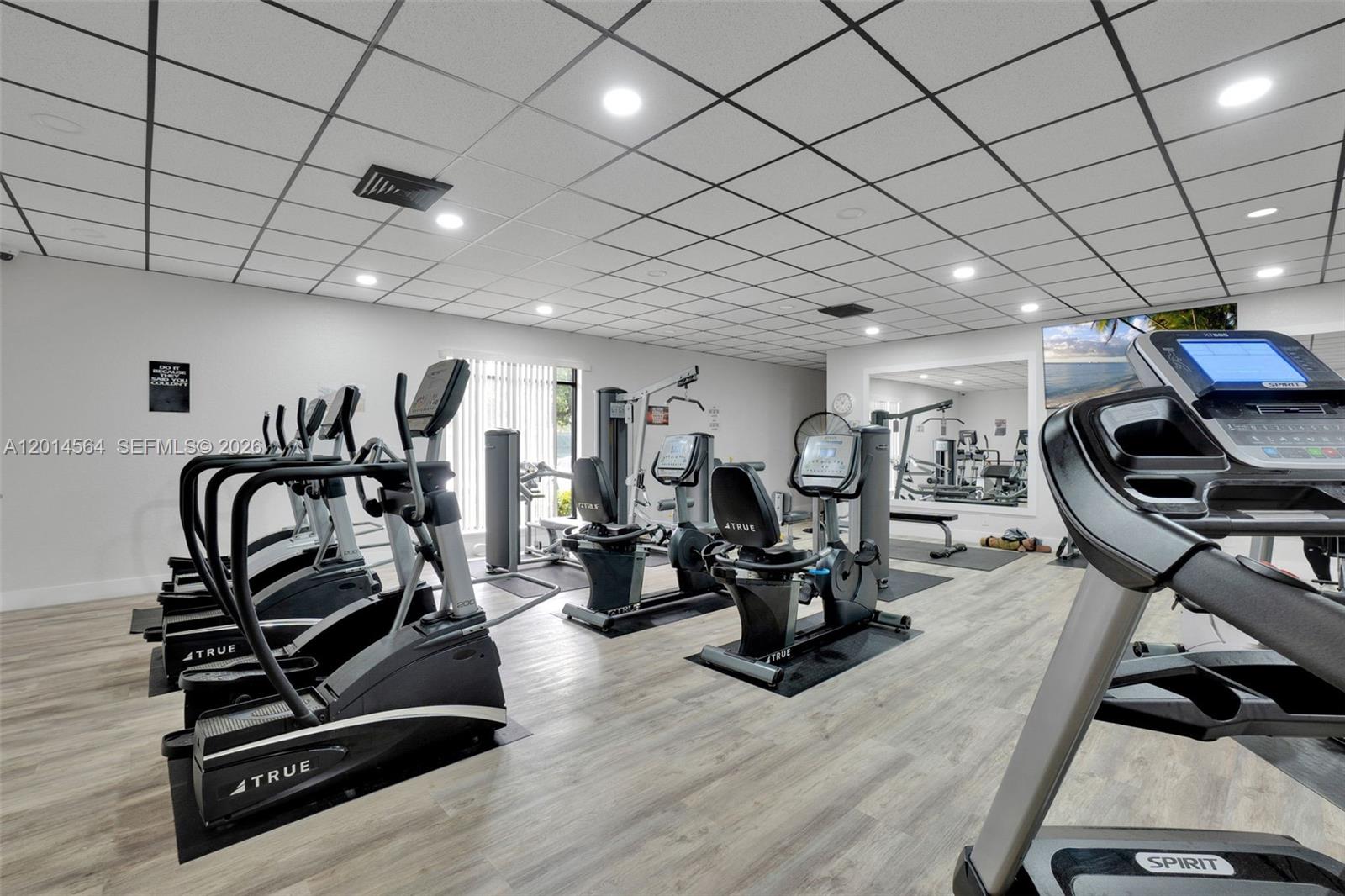 500 Egret Circle, Unit 8403 Delray Beach, FL 33444 - Photo 27 of 32 a view of a room with gym equipment