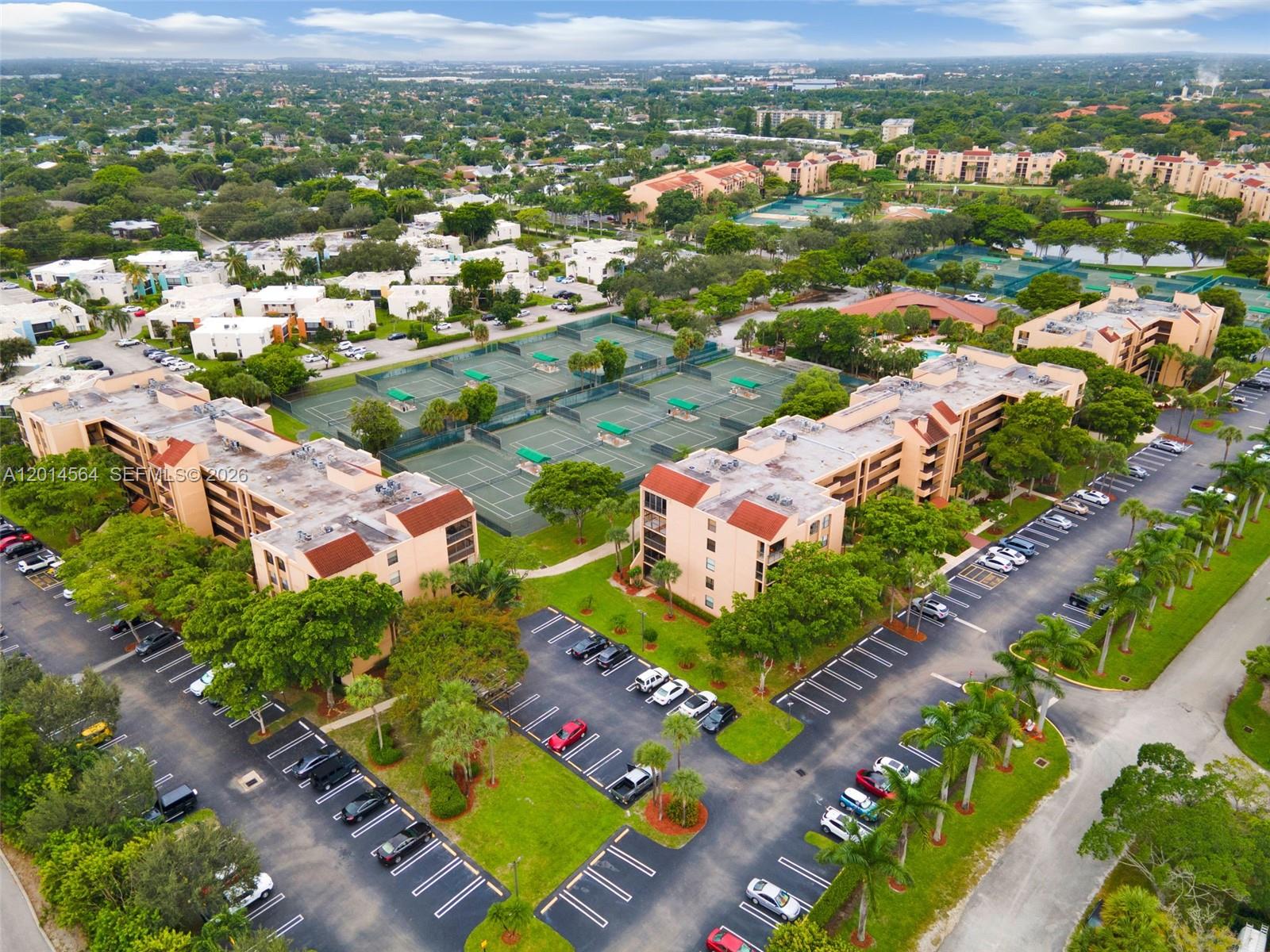 500 Egret Circle, Unit 8403 Delray Beach, FL 33444 - Photo 32 of 32 an aerial view of residential houses with outdoor space