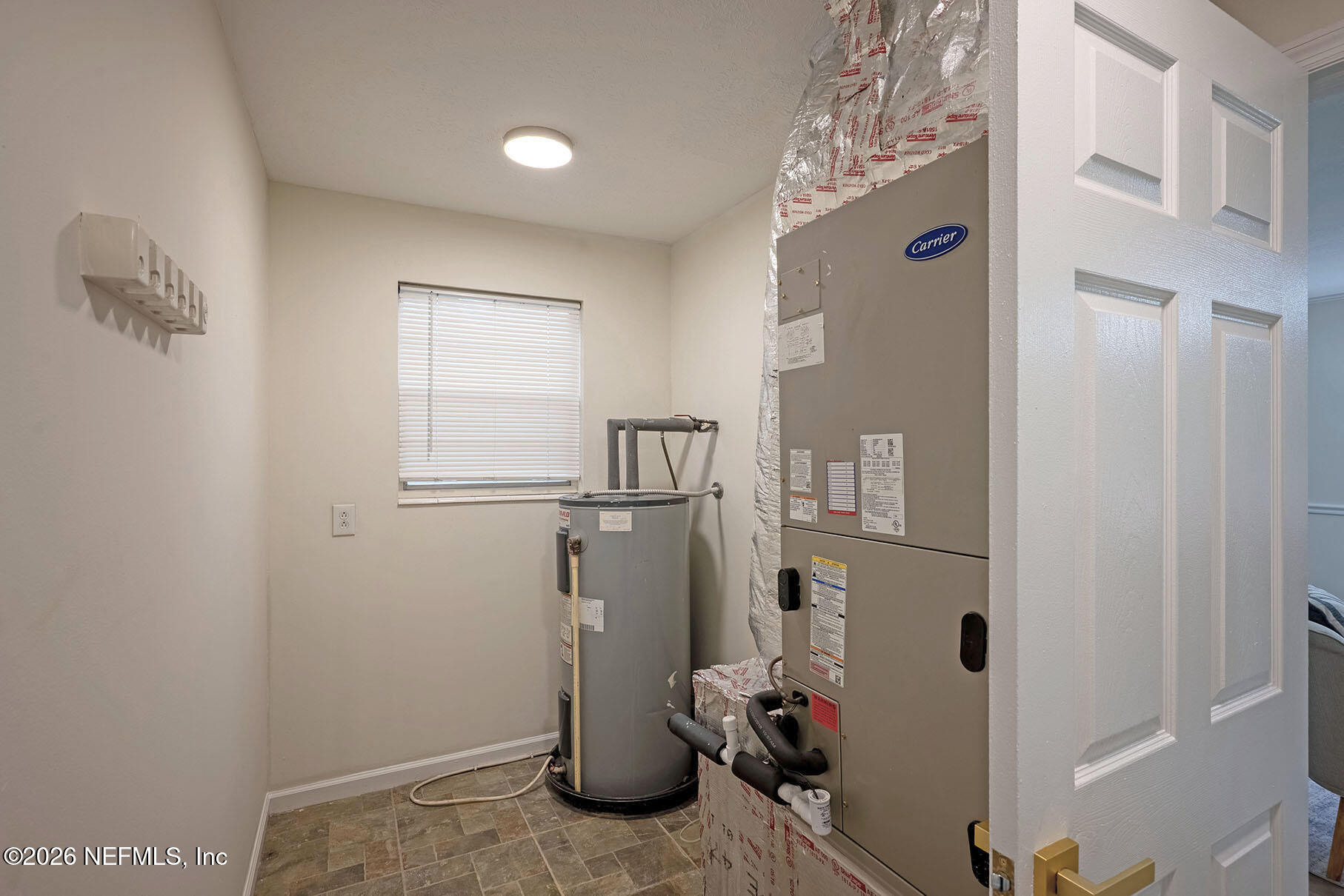4061 Heath Road Jacksonville, FL 32277 - Photo 44 of 52 43 Storage and Utility Closet