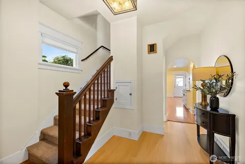 a view of entryway with wooden door