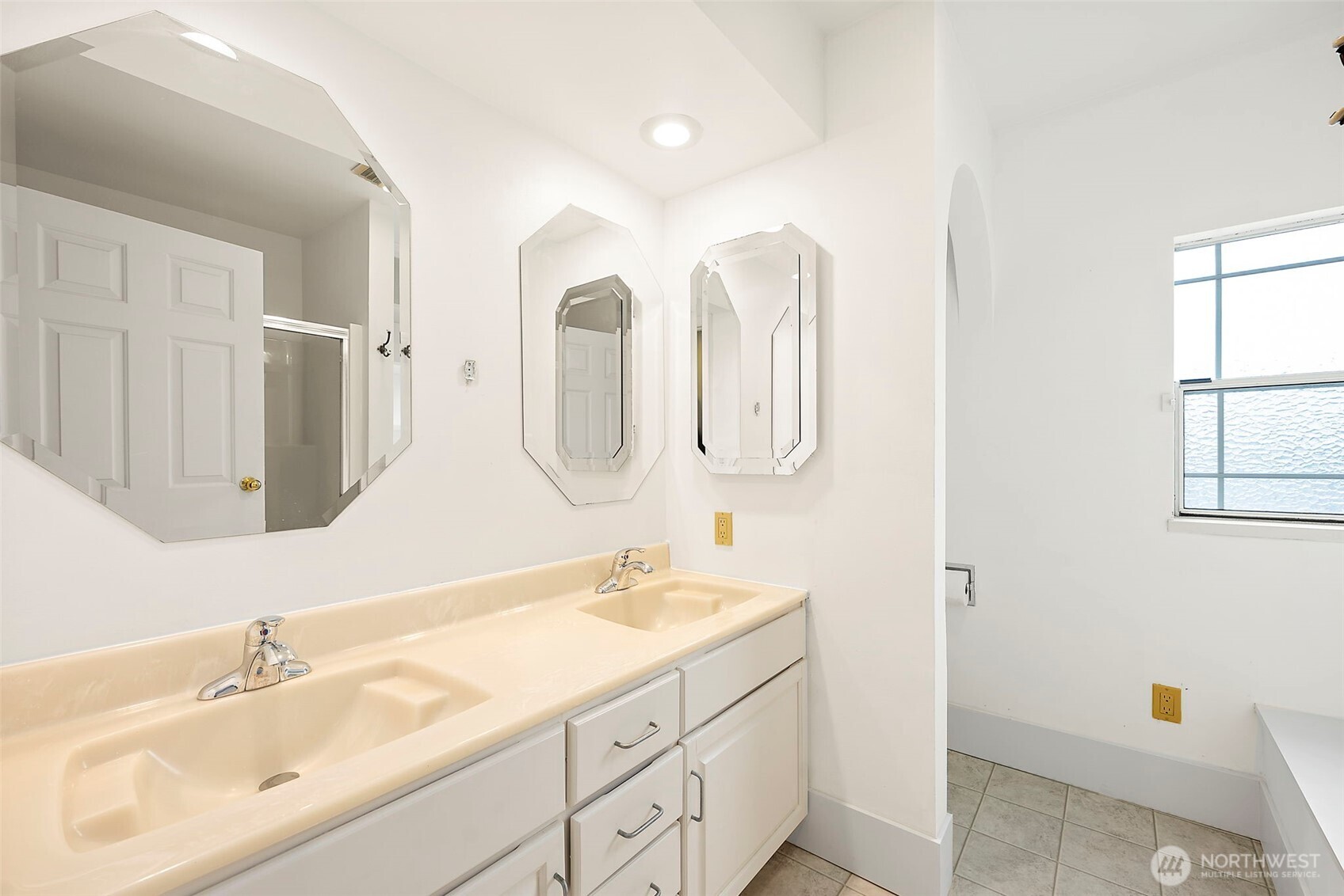 5207 North Pearl Street Ruston, WA 98407 - Photo 27 of 39 a bathroom with a double vanity sink mirror and
