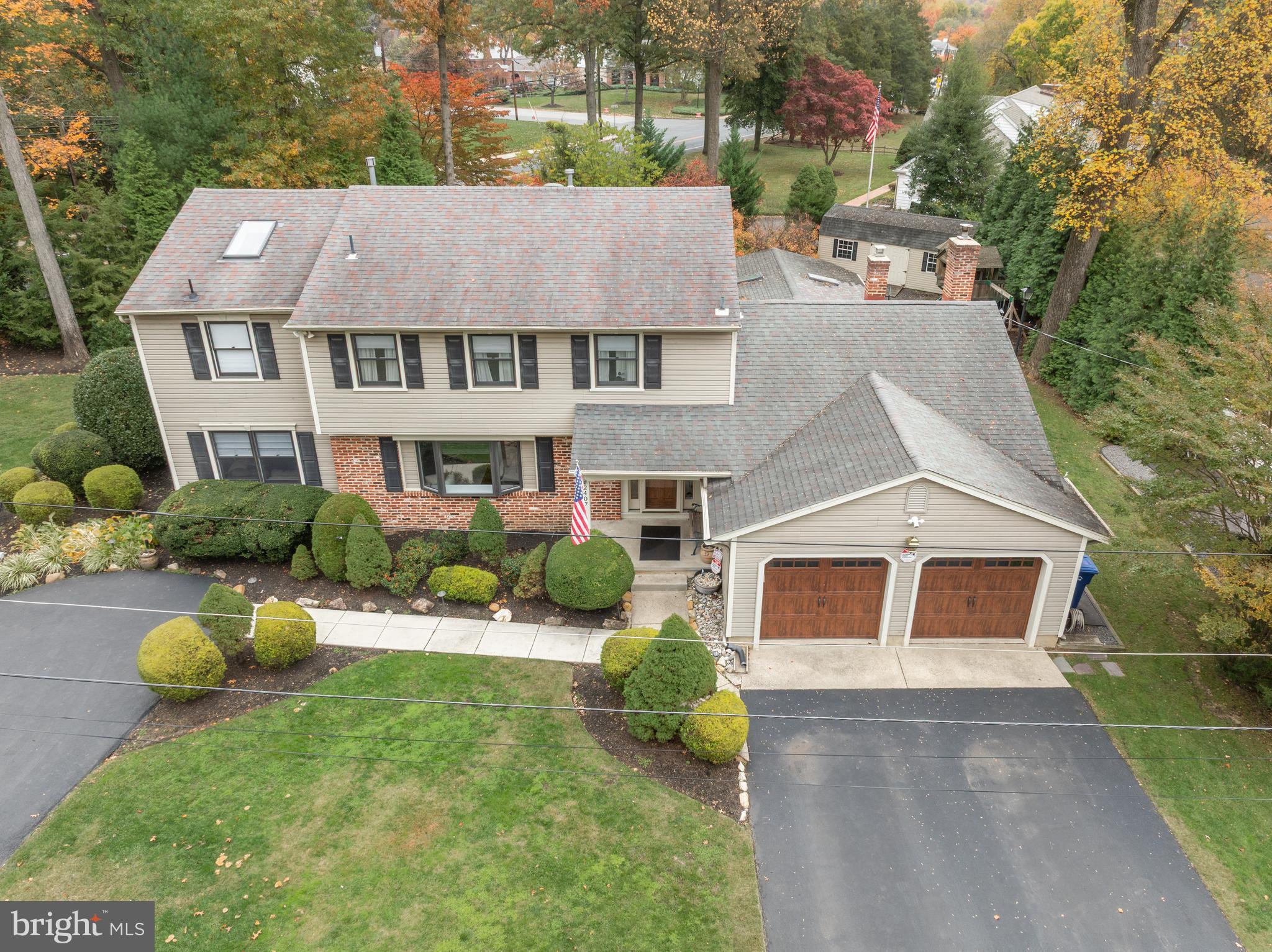 2407 Riverton Road Cinnaminson, NJ 08077 - Photo 2 of 54 an aerial view of a house with swimming pool and garden
