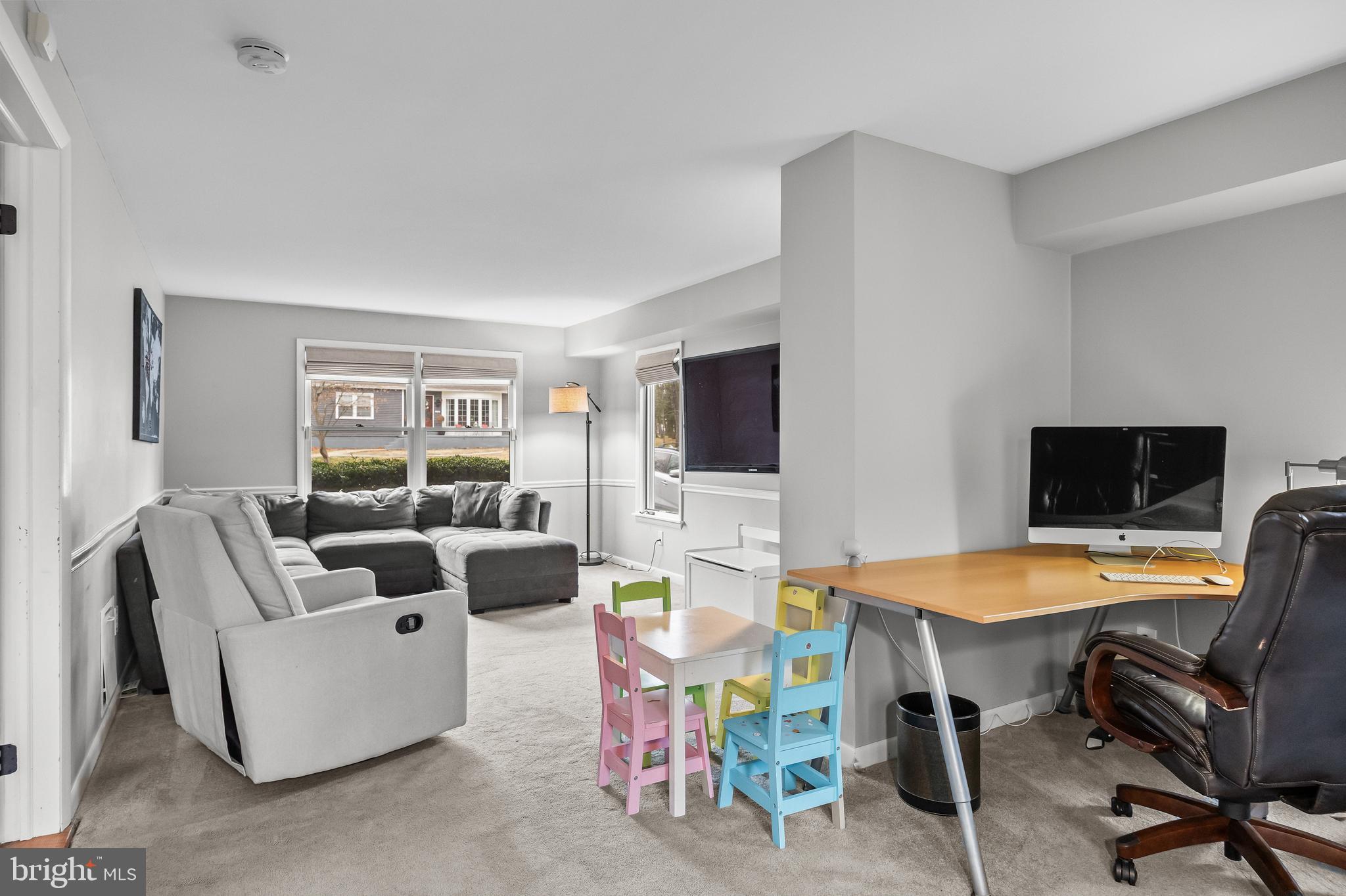 2407 Riverton Road Cinnaminson, NJ 08077 - Photo 27 of 54 a view of a livingroom with furniture and a flat screen tv