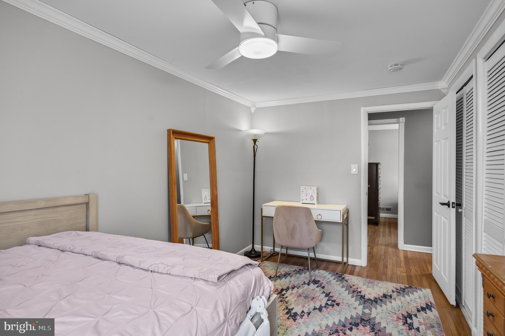 2407 Riverton Road Cinnaminson, NJ 08077 - Photo 29 of 54 a bedroom with a bed and a dresser in it