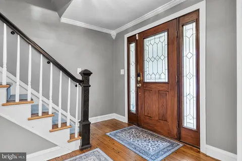 a view of an entryway with a front door